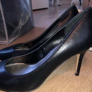 Black pumps worn once